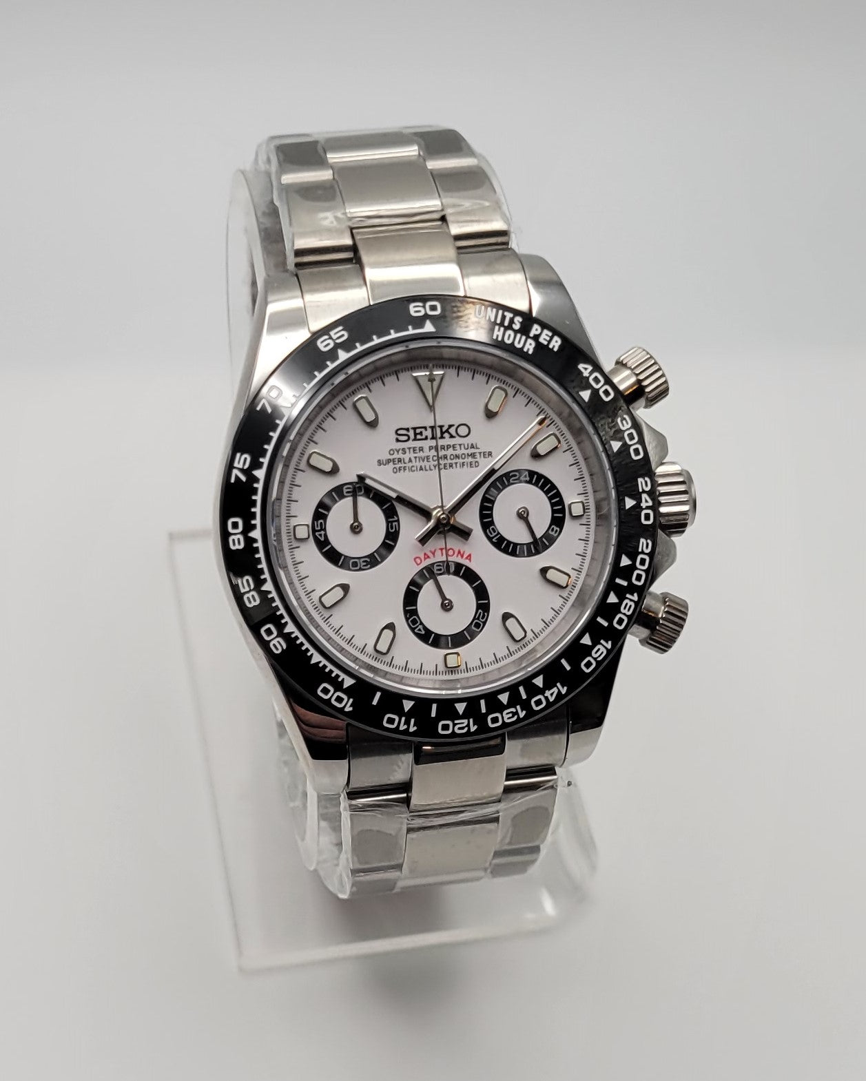 Seiko watch with silver and black design on a white background