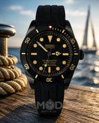 Black Seiko watch with yellow accents on a wooden surface with a blurred background