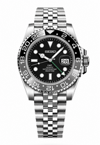 A Seiko GMT Quartz watch with a stainless steel Oyster bracelet, featuring a black dial, black bezel, and silver-tone case and bracelet, shown against a plain white background.