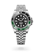 Seiko watch with black face, green bezel, and silver metal bracelet on a white background