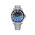 Silver Seiko watch with a blue and black bezel on a white background