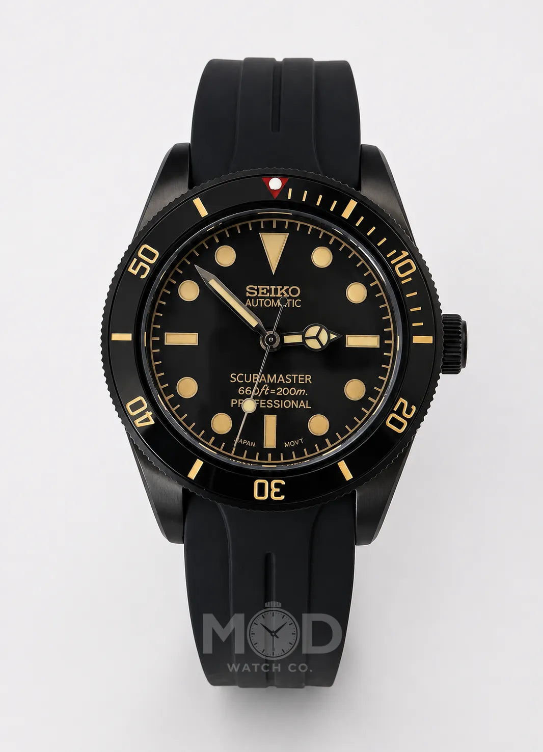 Black Seiko watch with gold accents on a white background