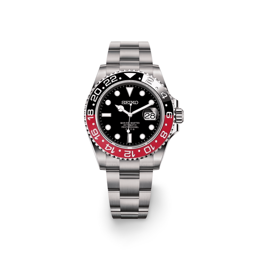 Seiko watch with black face and red bezel on a white background