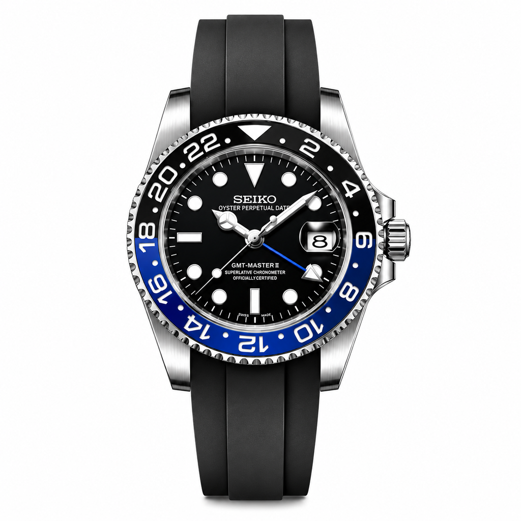 Seiko watch with black rubber strap and blue bezel on a white background