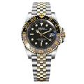 Seiko watch with black dial and two-tone metal bracelet on a white background