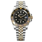 Seiko watch with black dial and two-tone metal bracelet on a white background